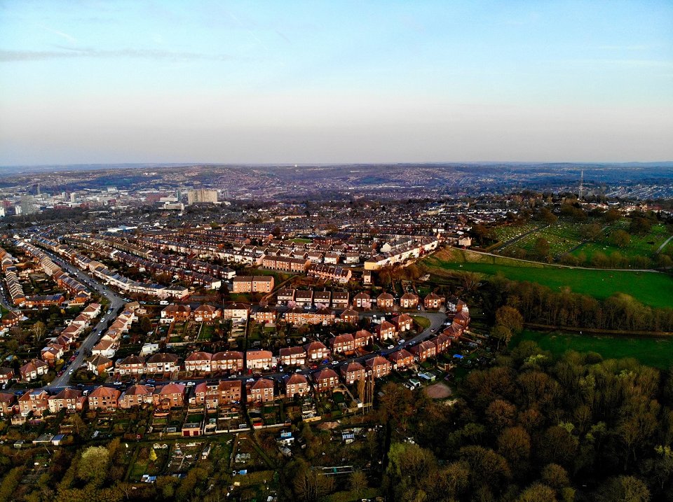 Ariel shot of a housing estate in a sunny setting