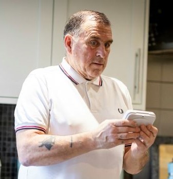 Resident using assistive technology