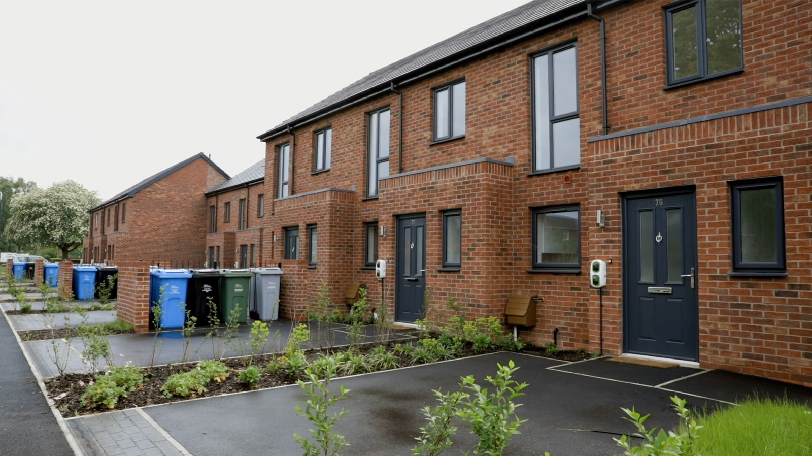A row of new terraced homes on the Sale West Estate