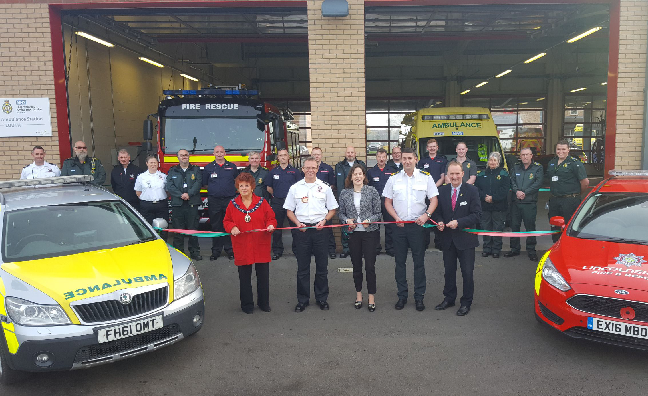 Louth fire station staff stood outside the fire station