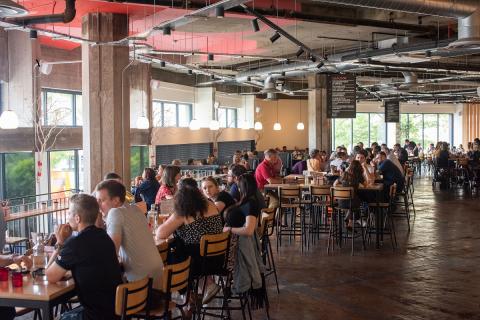 Food hall in Sheffield with hundreds of people eating and socialising