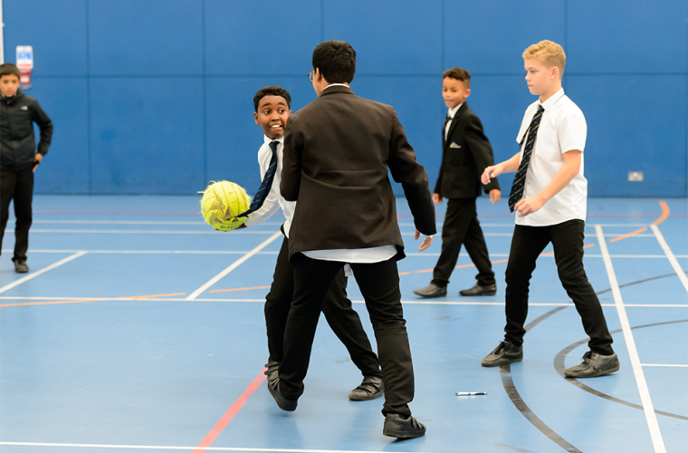 Group of children playing basketball 