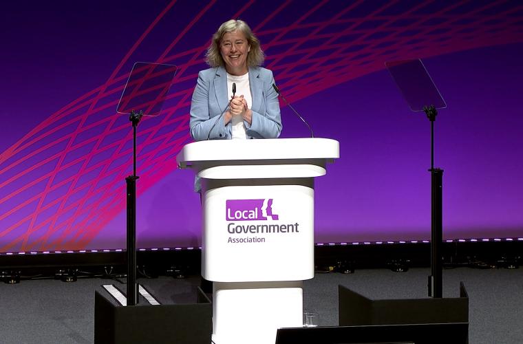 Joanna Killian on stage at LGA conference