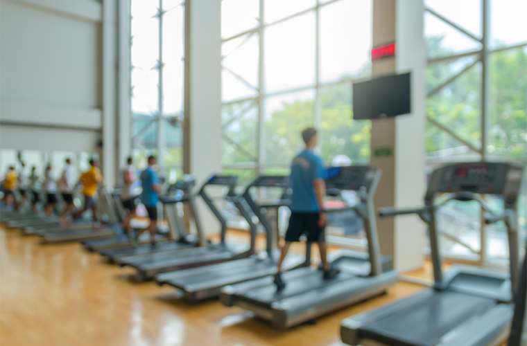 Treadmills lined up in a leisure centre