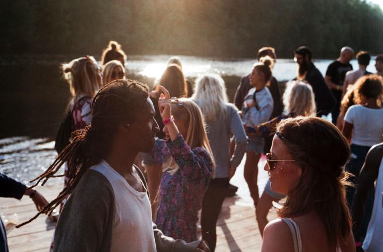 Young people by a lake