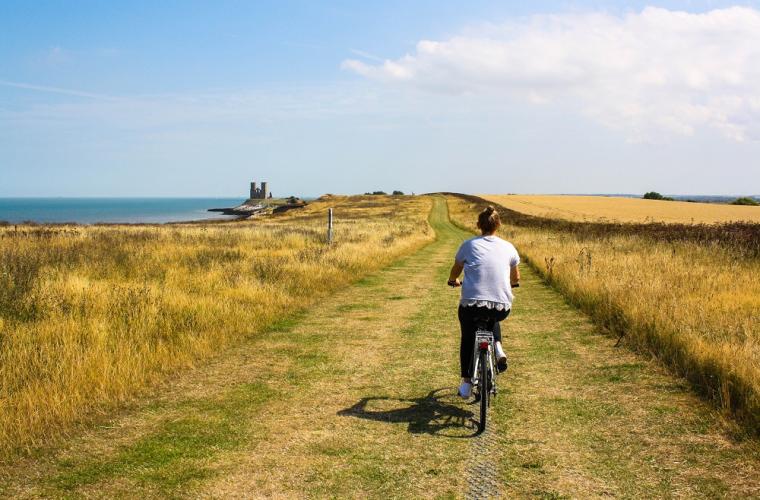 A cyclist riding in the countryside