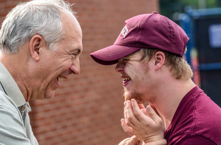 Carer smiling with person 
