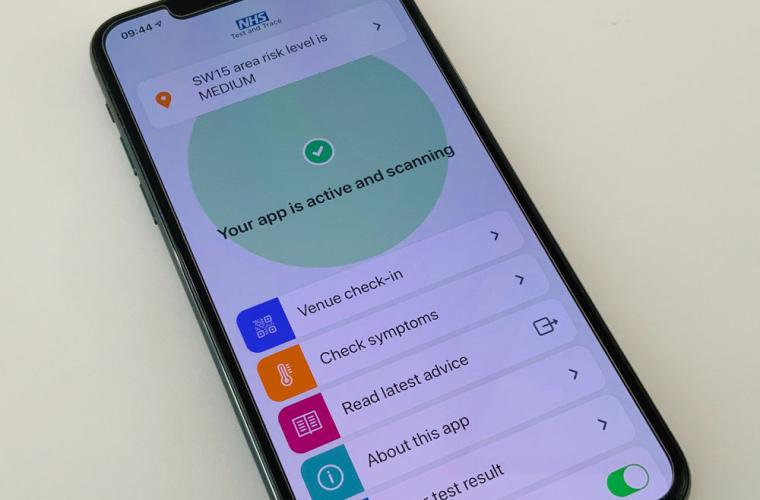 A mobile phone showing the interface of the NHS test and trace app