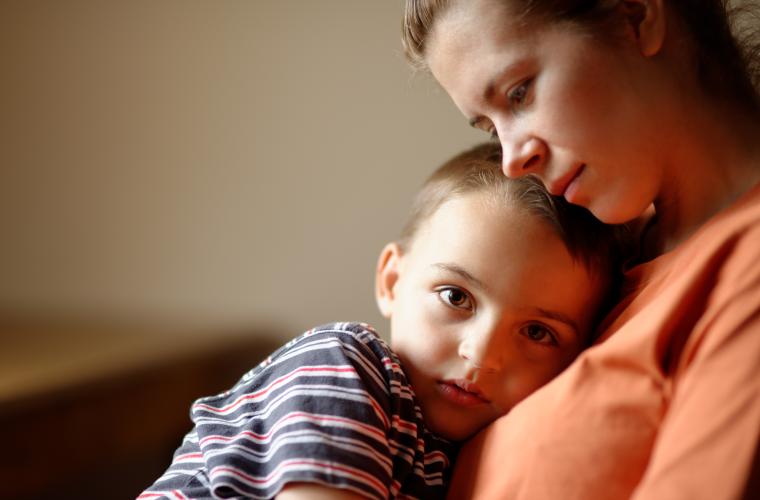 photo of mother and son on sofa