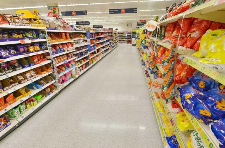 photo of crisps and chocolate on a supermarket aisle 