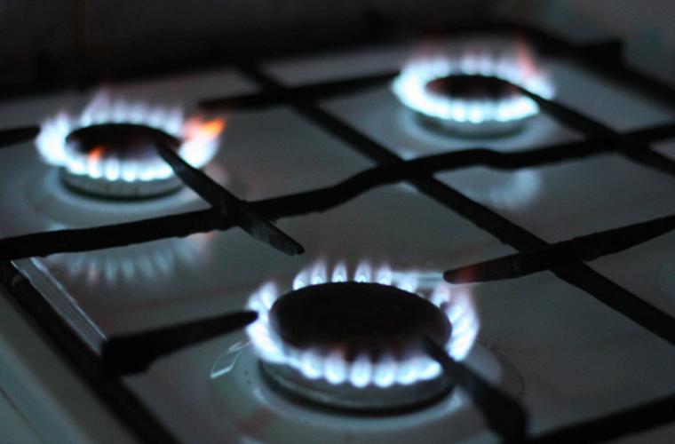 three gas hobs burning 