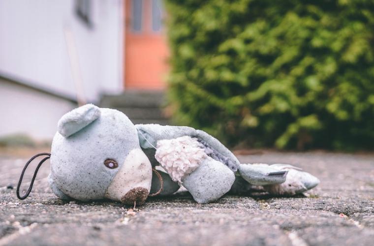 blue teddy bear on ground