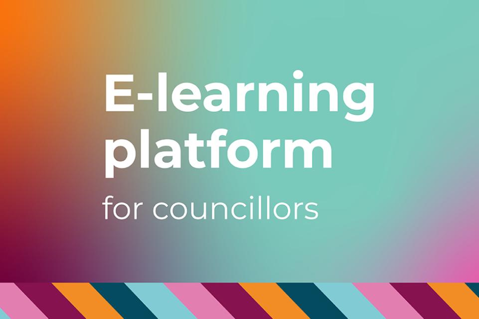 E-learning platform words in white and an orange, green and pink background colour scheme