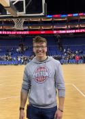 Edward Groome profile picture showing him in a basketball hall